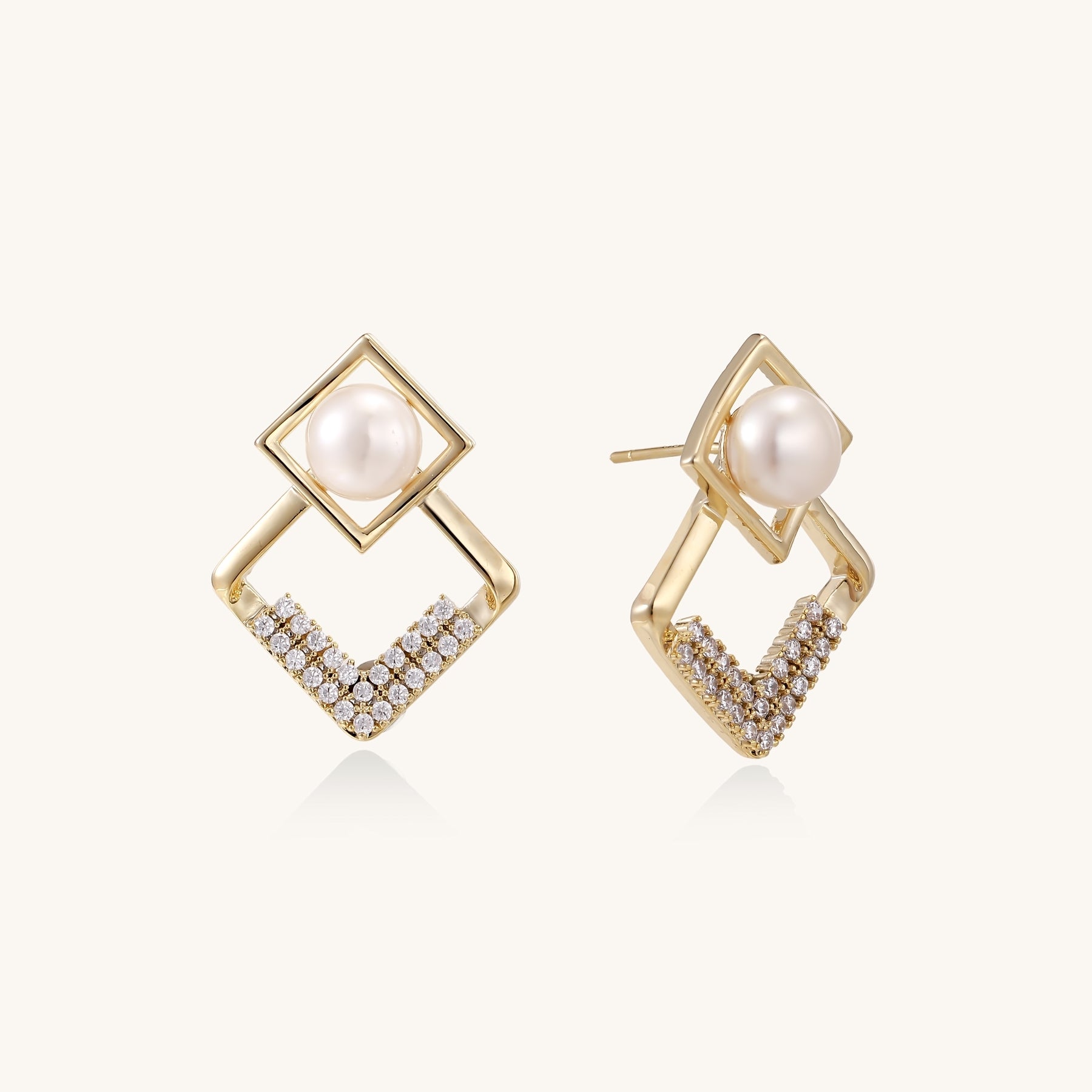 Gold-plated geometric drop earrings with freshwater pearls in square frames and crystal-accented diamond-shaped dangles