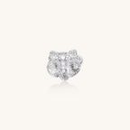 Gold-plated brass ring with textured orchid petals, zirconia stones, and center pearls on white background.