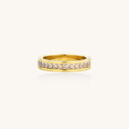 14K gold plated ring with channel-set zirconia stones and Greek key pattern engraved on sides on white background