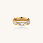 14K gold plated ring with center rhinestone and accent stones along the band on white background.
