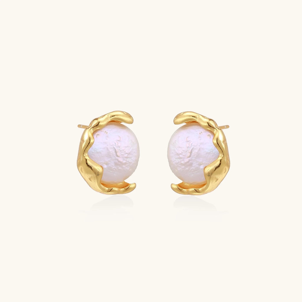 Gold vermeil studs with lustrous pink freshwater pearls in organic crescent settings