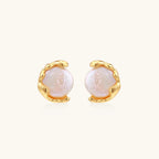 Gold vermeil studs with lustrous pink freshwater pearls in organic crescent settings